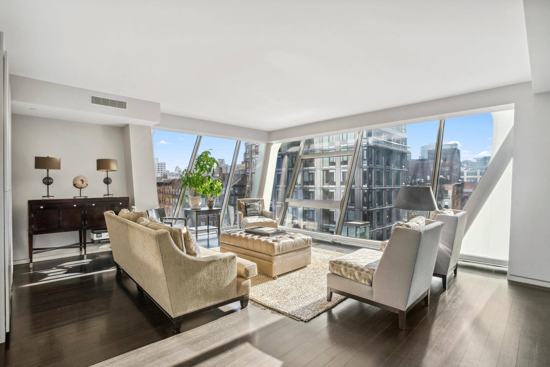 Experience luxury living in this exceptional 2300 SF three bedroom, three bathroom condominium, gracefully positioned over the High Line and offering sweeping panoramic city views in a full service doorman ...