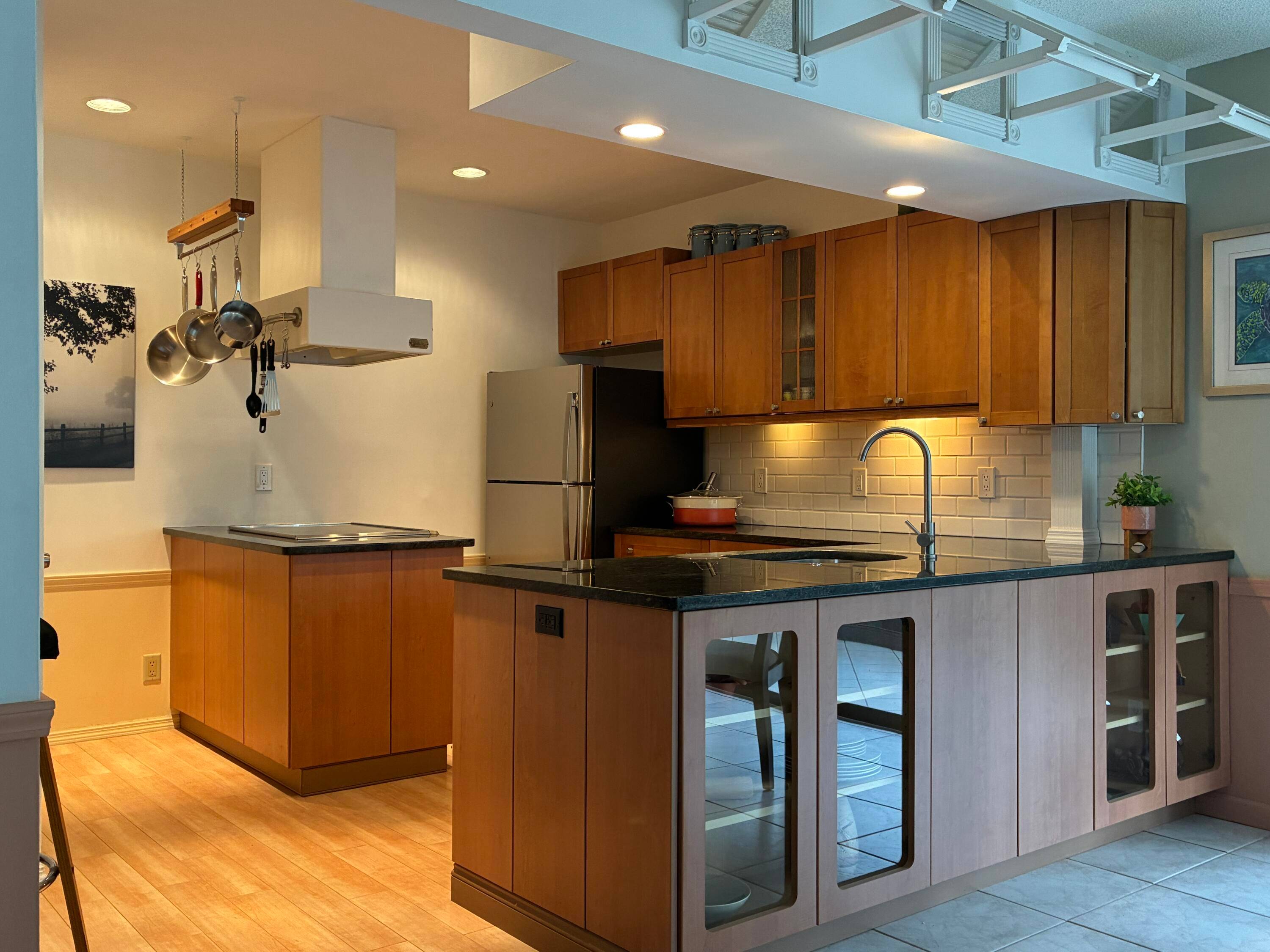 Rare first floor end condo with wrap around lake and golf course views.