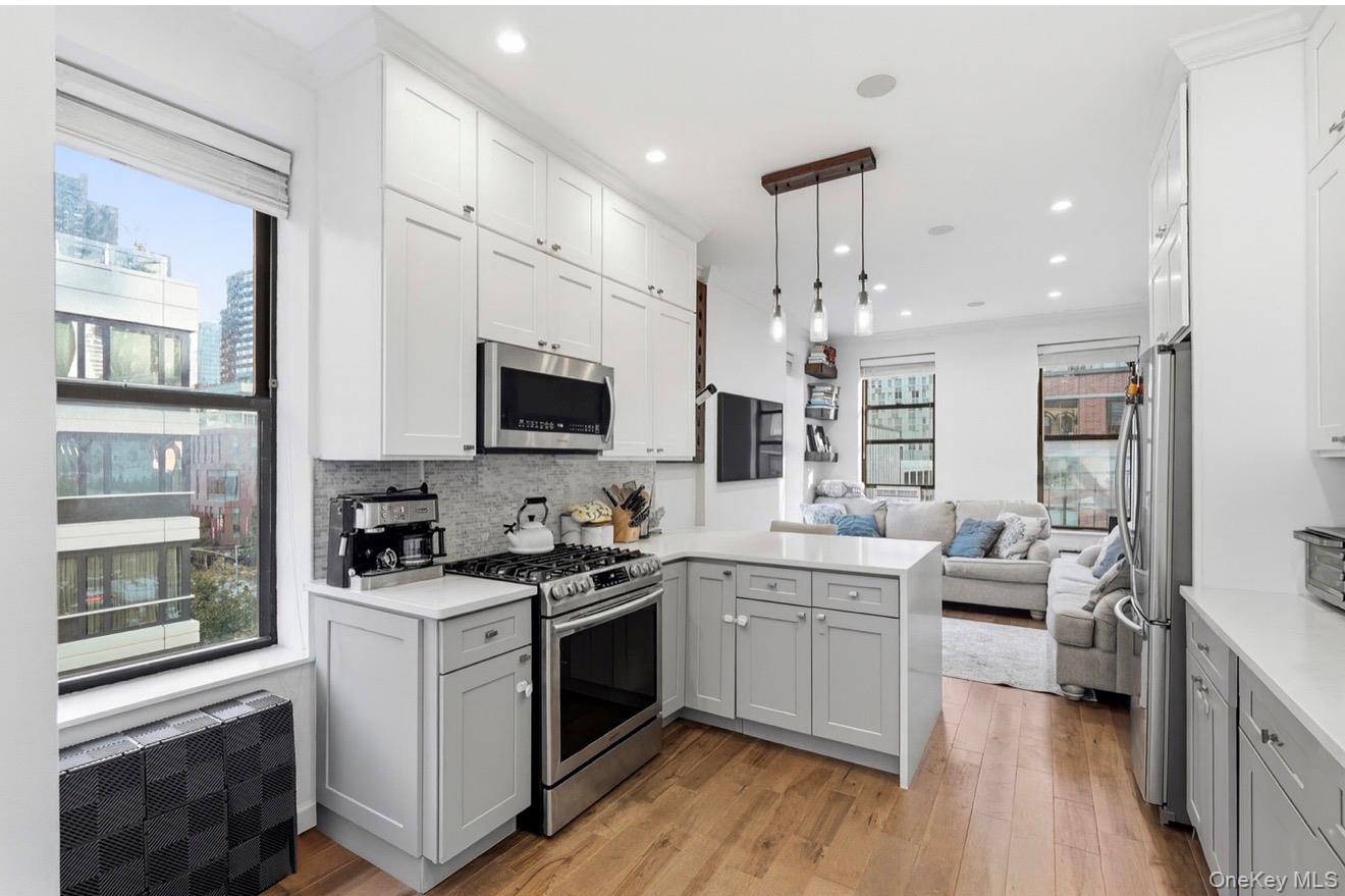 Fully Renovated Sun Filled Corner Apartment in the Heart of Hell s Kitchen !