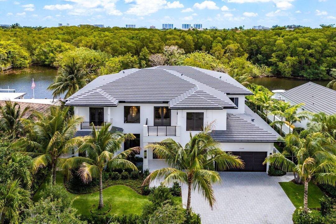 Spectacular New Construction Waterfront Estate Overlooking the El Rio Canal Preserve Area, Five En Suite Bedrooms, 2nd Floor Club Room w Half Bath, 93' of Waterfront with New Seawall 73' ...