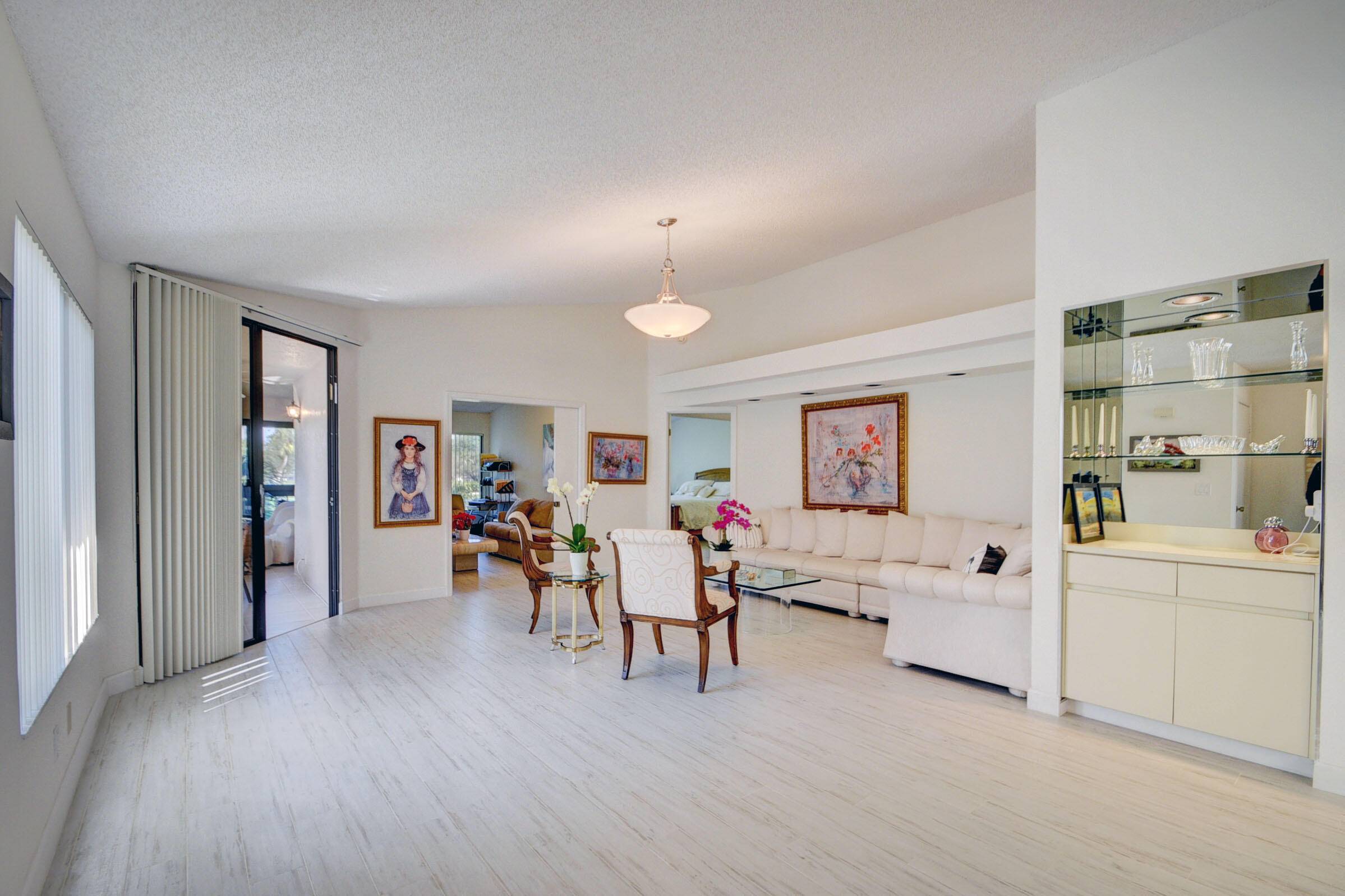 MAGNIFICENT, STUNNING WATER FRONT AND GOLF COURSE VIEWS FROM THIS TWO BEDROOM TWO BATHROOM PLUS DEN CONDO.