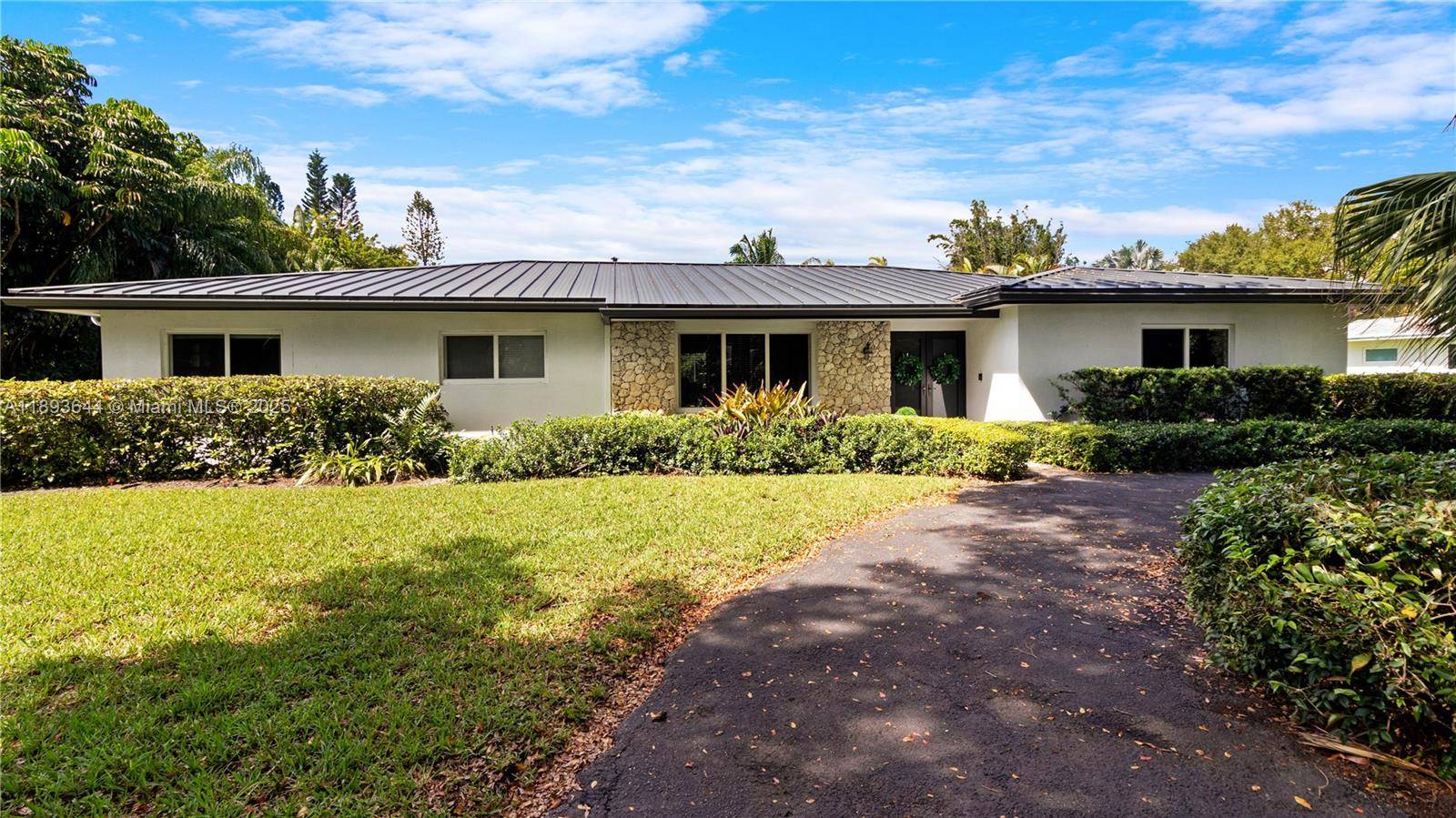 Lush 4BR 2BA home in North Palmetto Bay, just minutes from Pinecrest and 5 minute walk to Coral Reef Park.