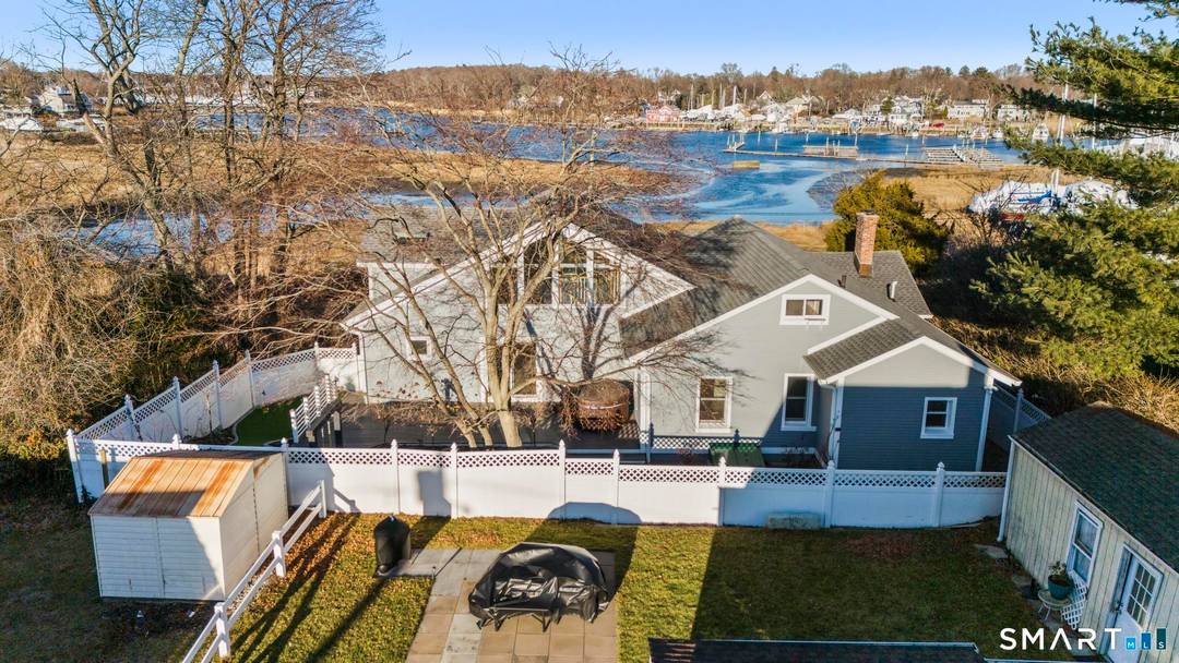 Set in one of Milford's most coveted locations, Fort Trumbull Beach, this exceptional home offers the rare combination of walkability to downtown direct harbor water views.