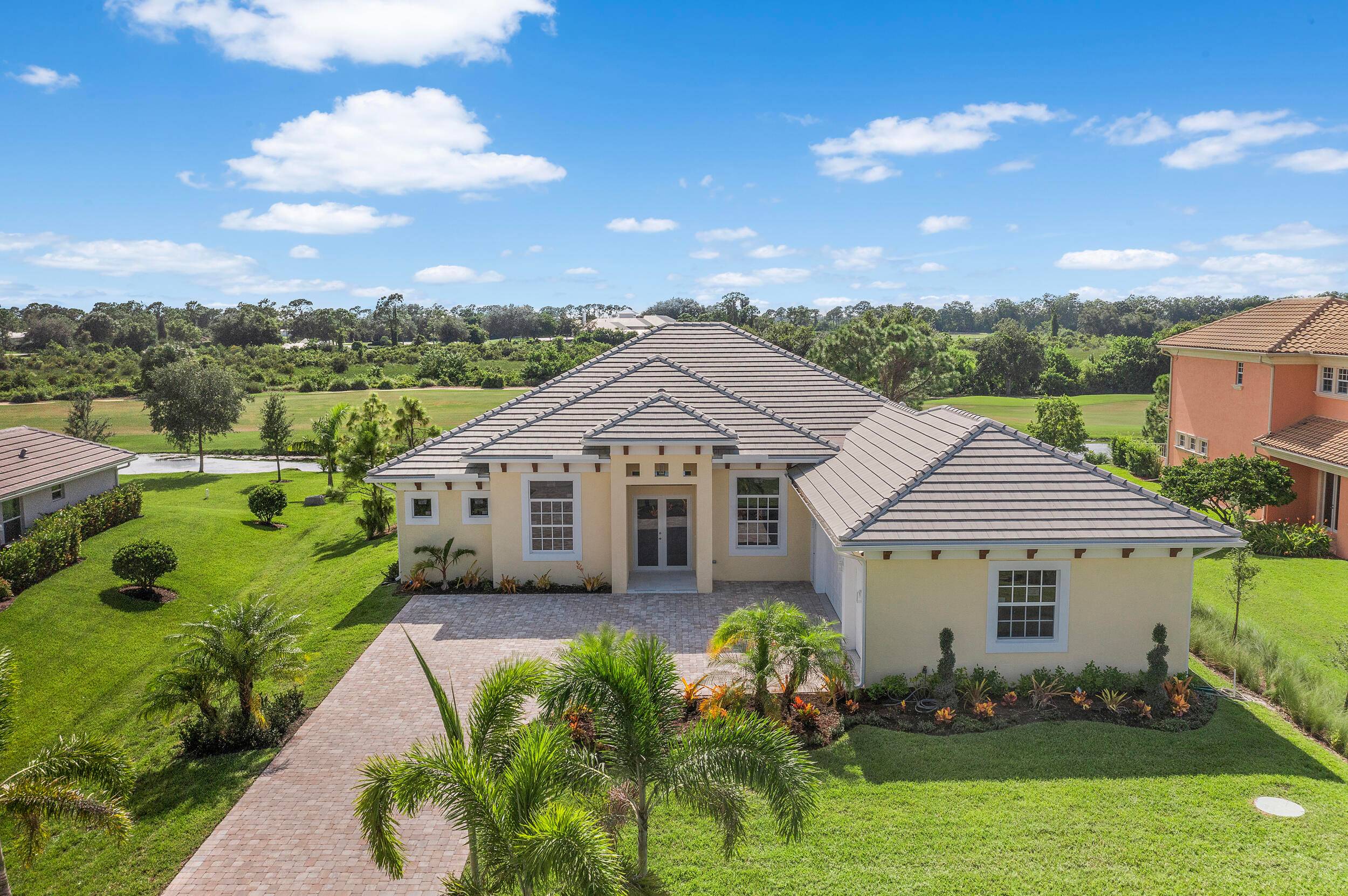 Brand new modern estate in Palm City's prestigious Cobblestone community, overlooking the recently renovated Cape Club golf course.