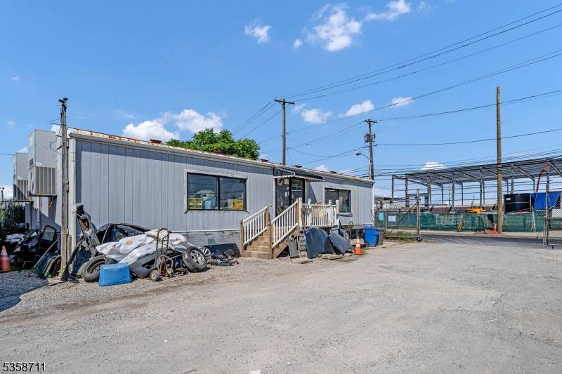 Unlock the potential of this exceptional freestanding commercial property, ideally situated with breathtaking Lake Water Views.