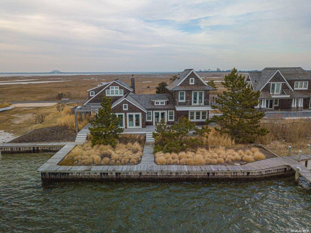 SPECTACULAR WATERFRONT HOME Beautifully appointed FULLY FURNISHED 4 Br Home on Captree Island !