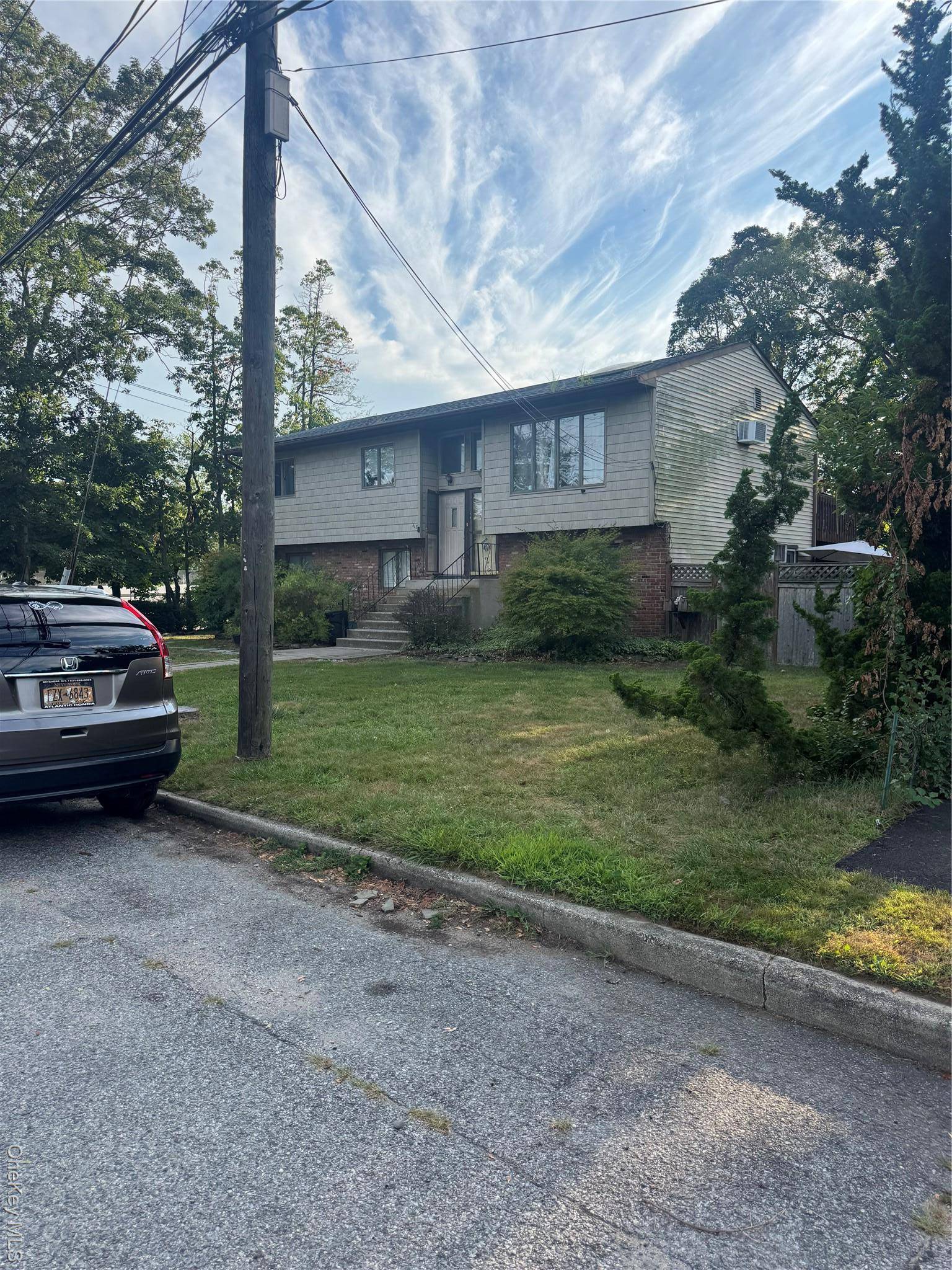 Sunny and spacious first floor 3 BR 1 Bath apt with yard use and driveway parking.