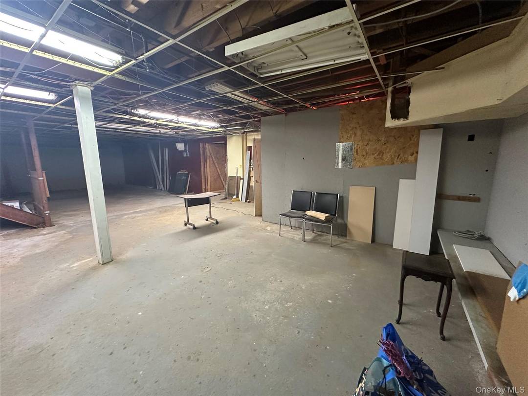 Prime commercial space for rent in the heart of Hempstead offering an open concept layout with high ceilings and two separate entrances.