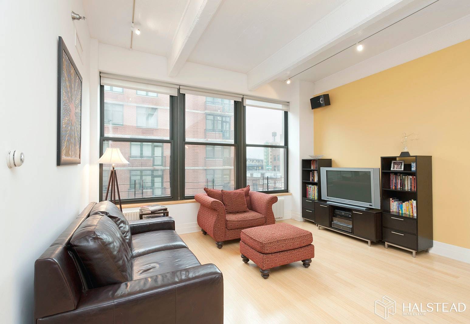 Stunning D. U. M. B. O. loft available in full service building.