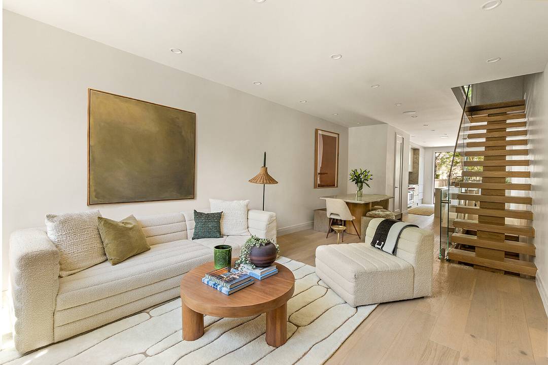 Unmatched luxury awaits in this brand new four story townhome, situated on a peaceful tree lined street in the heart of South Slope.