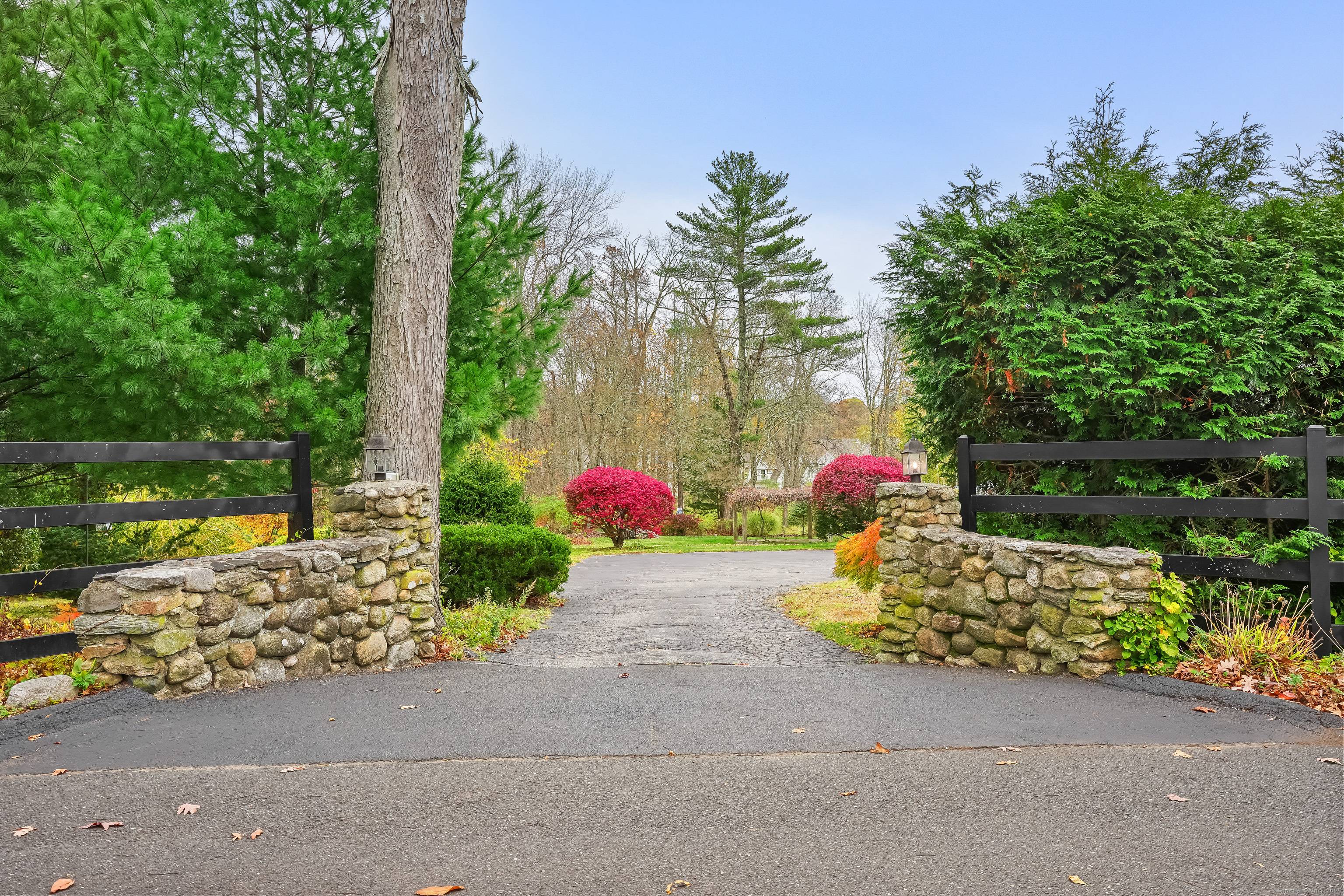 Are you seeking a dreamy early 20th century home with vintage charm, impressive acreage, partially finished lower level, and an unparalleled location ?