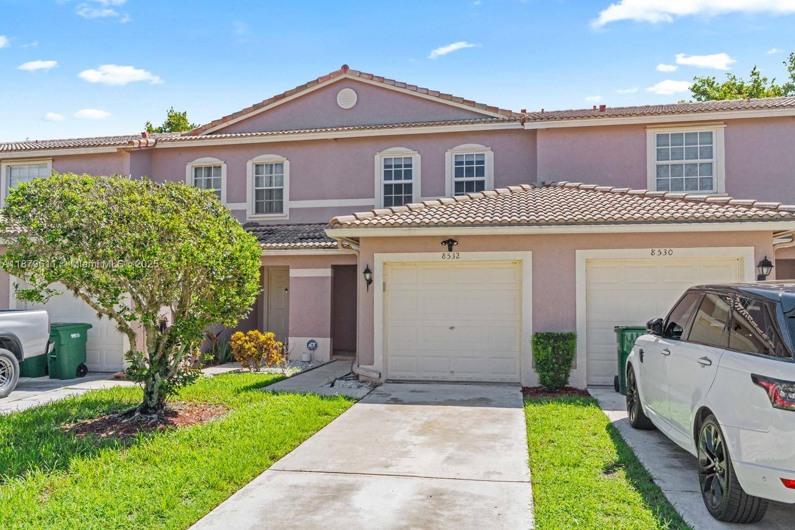 Affordable and stylishly renovated waterfront townhouse in the gated community of Southgate Shores.