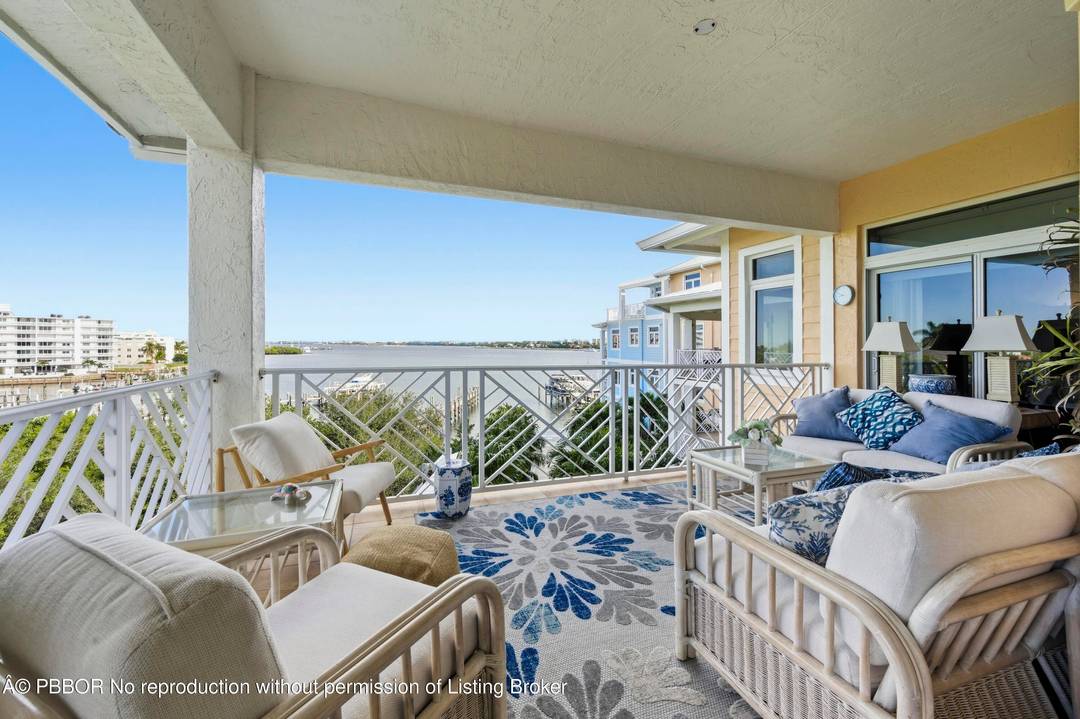 Experience the charm and spaciousness of this uniquely designed Key West style condominium, thoughtfully laid out to feel like a sprawling 2700 SF single family home.