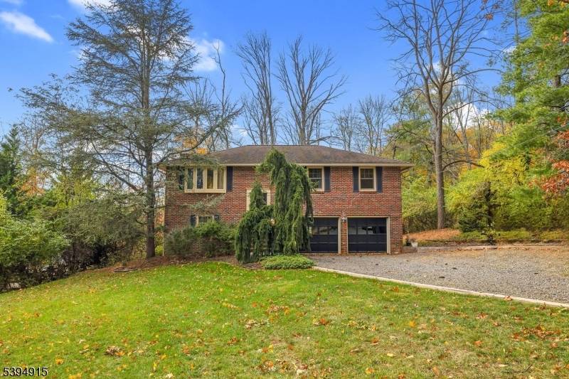 Welcome to this beautifully maintained 4 bedroom, 2 full bath brick home ideally situated in the heart of Warren.