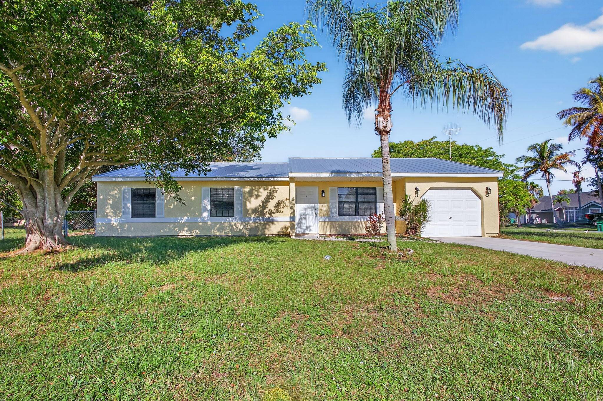 Great opportunity to own this 3 bedroom 2 bath 1 car garage pool home on a large corner lot.