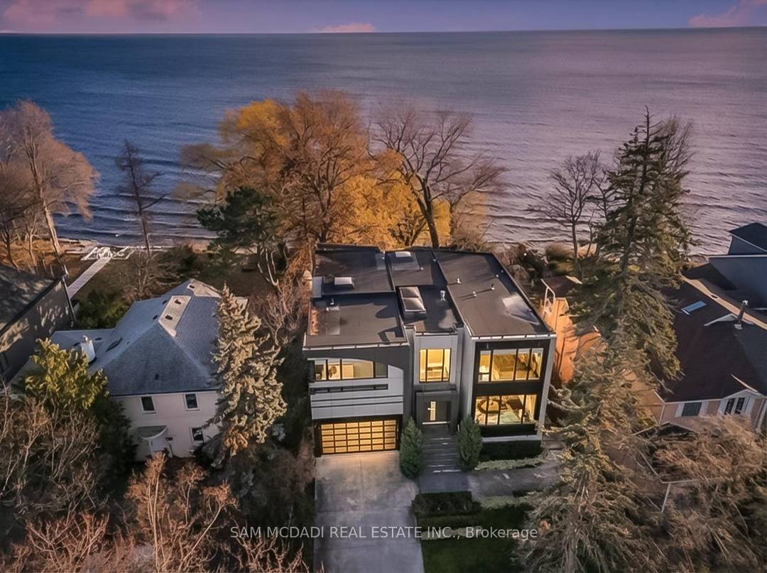 Set along South Etobicoke's prestigious lakefront corridor, this modern estate offers over 6, 200 SF of refined interiors paired with resort style amenities seldomly available.