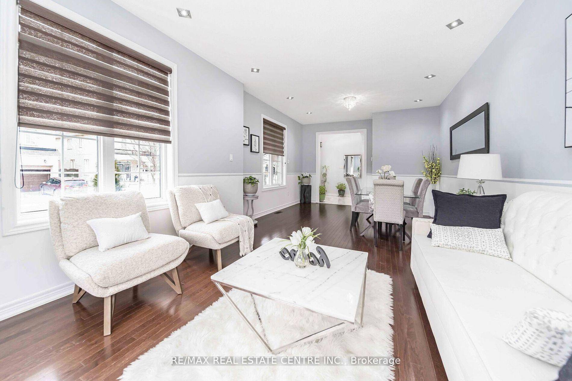 Beautiful Four Bedroom Detached Home with A Two Bedroom Finished Basement with Separate Entrance in A Quiet Neighborhood of Prestigious Credit Valley.