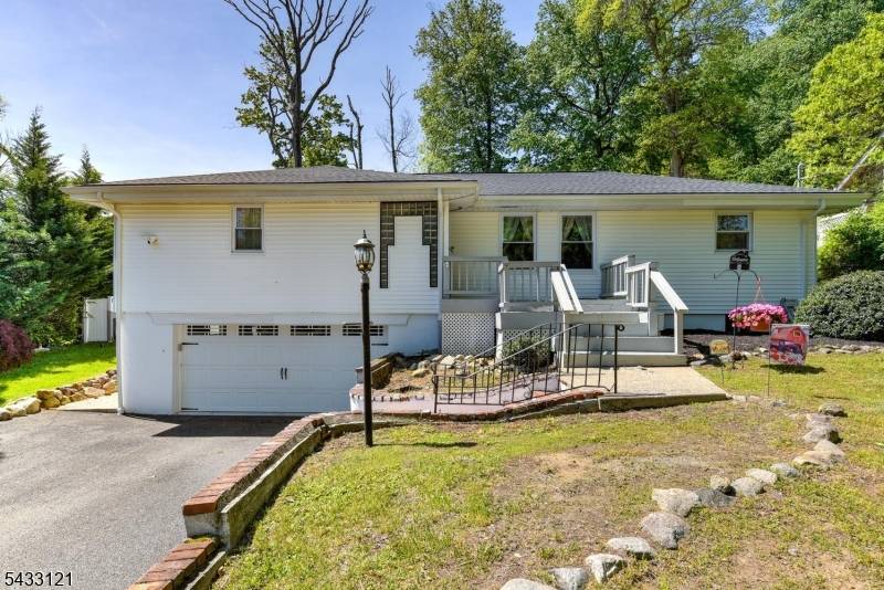 Beautifully maintained and move in ready, this 3 bedroom home is tucked away on a quiet street and situated on a picturesque park like property.