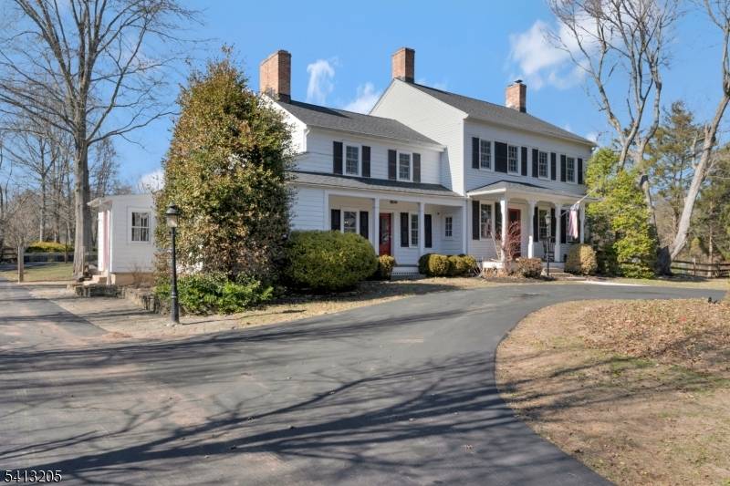 Step inside this beautifully updated 1806 Colonial, where historic charm meets modern comfort.