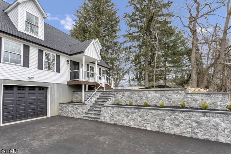 Brand New Construction Steps to Downtown Denville Train 4 bedrooms 3 full bathrooms Finished basement with flexible living space Huge patio with built in lights.