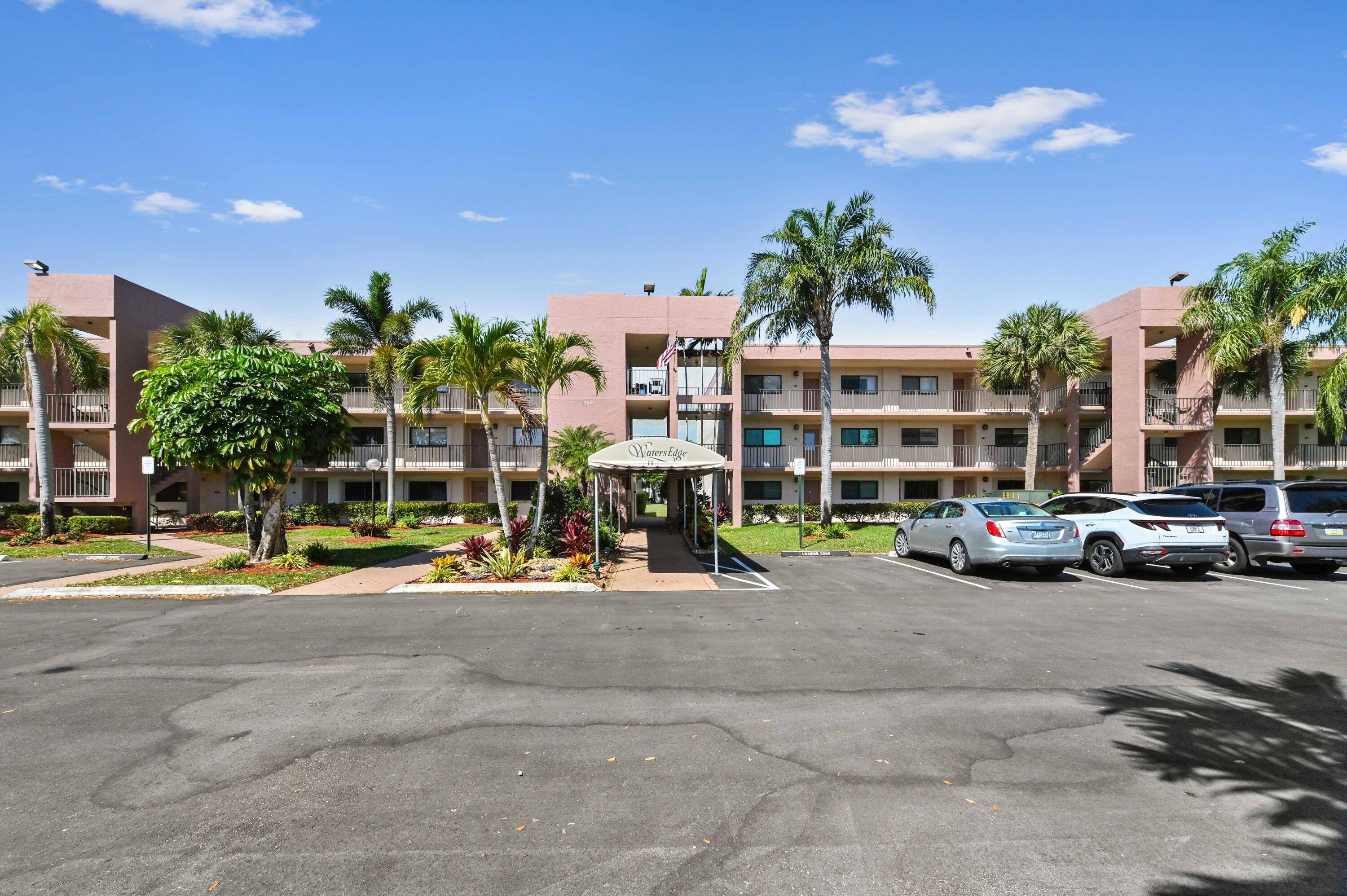 Sited in the secure and serene community of Lakes of Delray, the condominium residence at 15461 Pembridge Drive in Delray Beach, FL, showcases a fusion of charm and modern comfort.