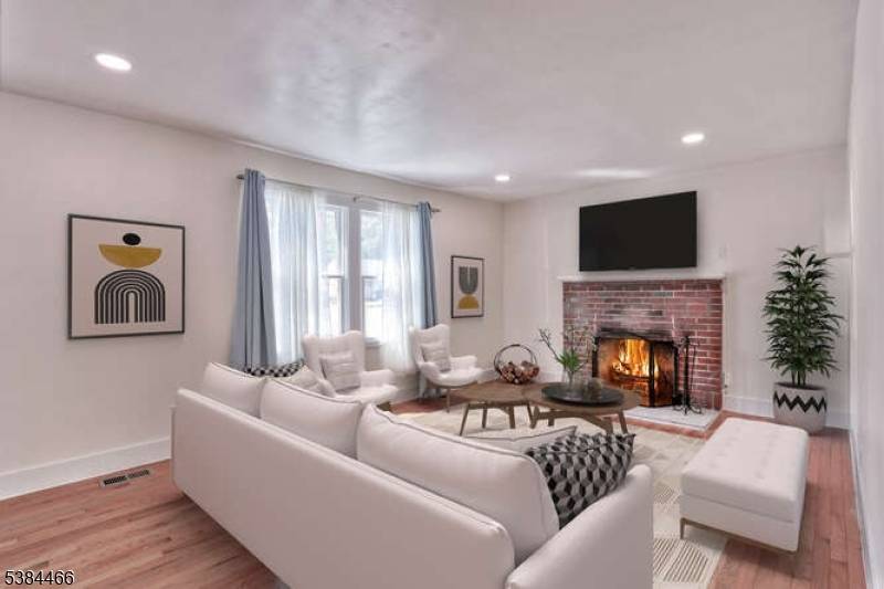 Welcome to this beautifully updated 4 Bedroom, 2 Full Bath Cape Cod style home in the heart of Ringwood's Skyline Lake Community.