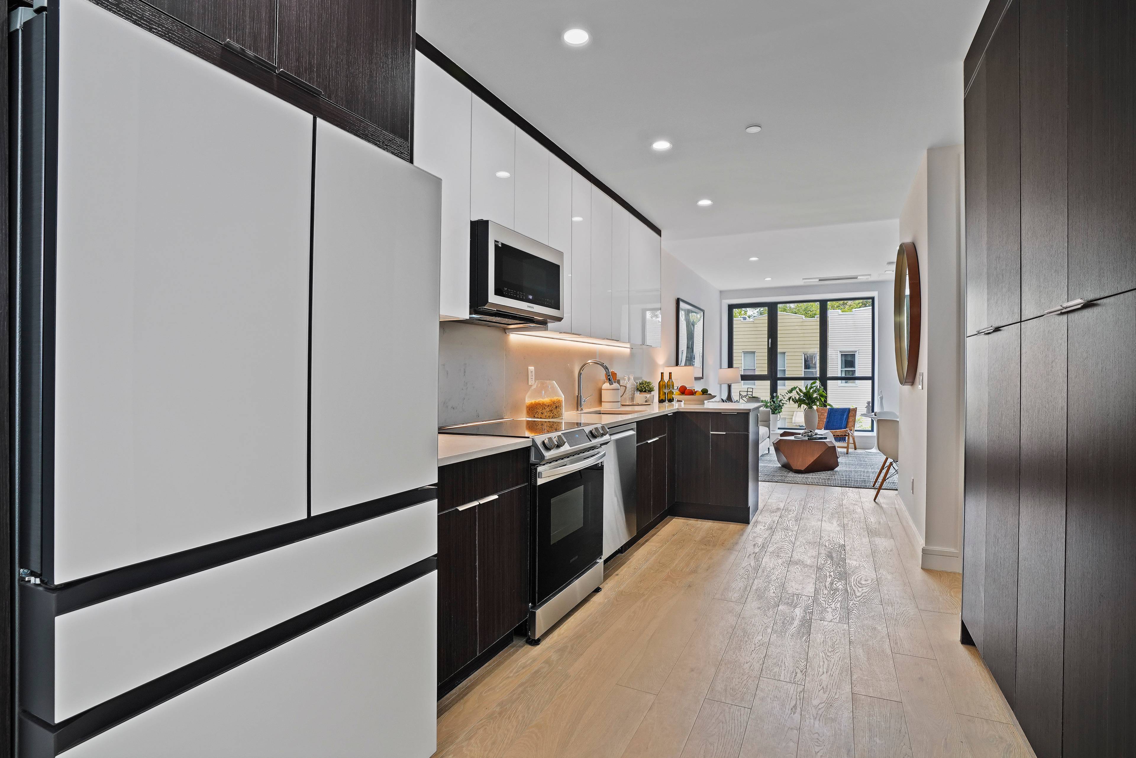 New Construction Enter into this thoughtfully designed split two bedroom, two bathroom home offering you a lifestyle of luxury and ease, with dramatic 9 ceilings, 6 white oak floors, and ...