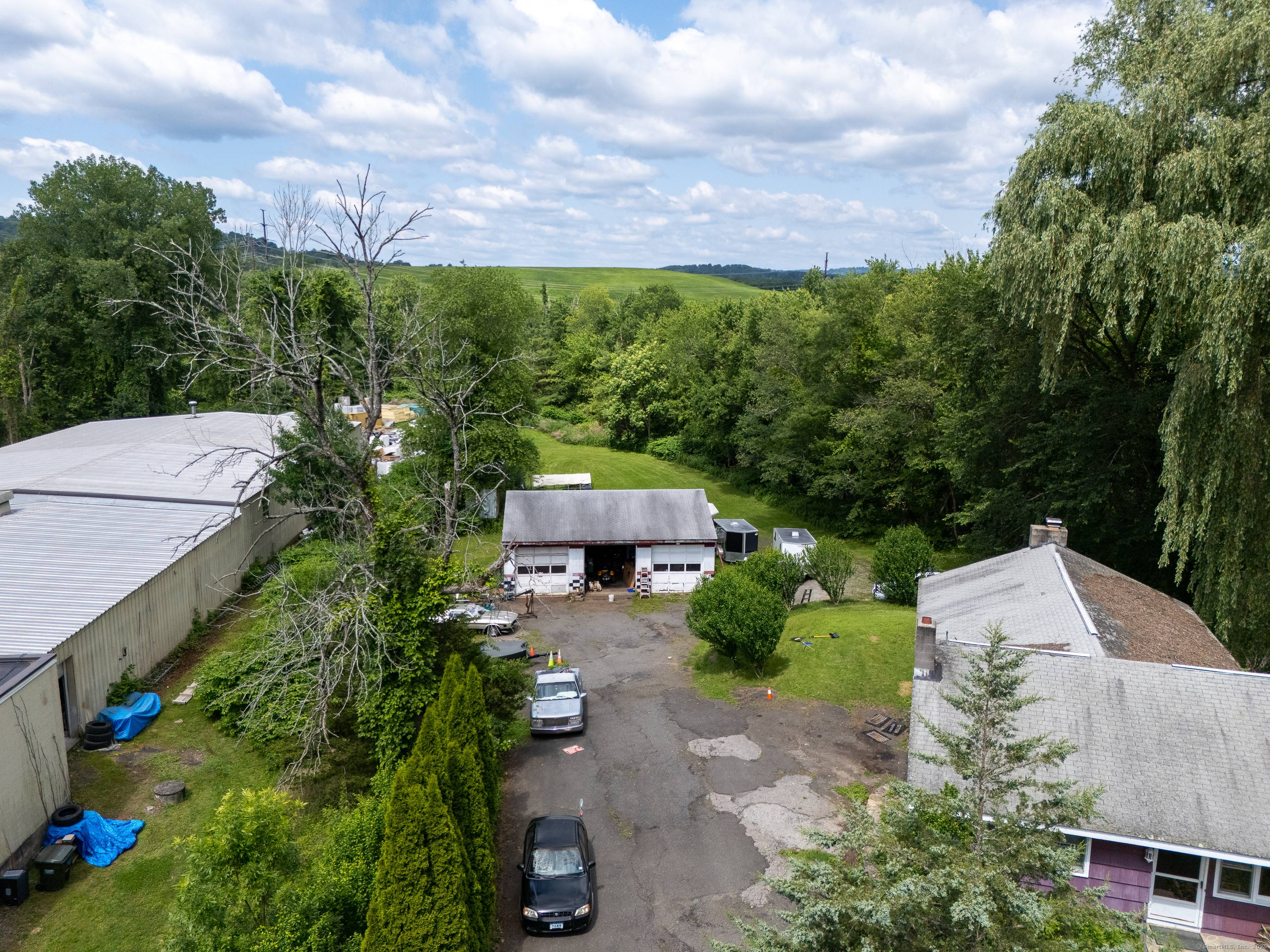Rare IG 80 zoned Industrial mixed use property with a 3 bay garage and 3 bedroom single family house.