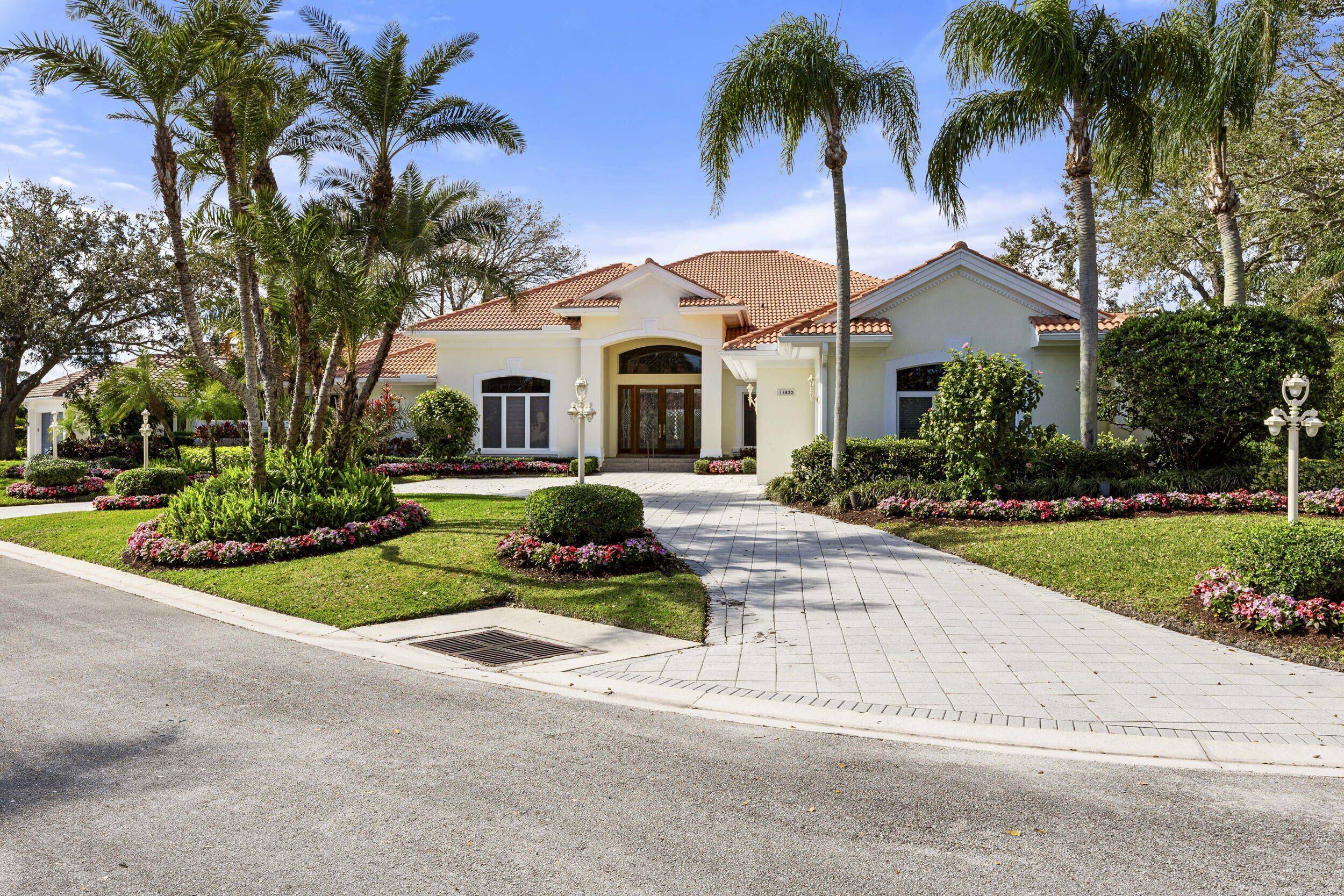Rarely offered, estate style country club home offering wide views of the water, golf course, and wetlands.