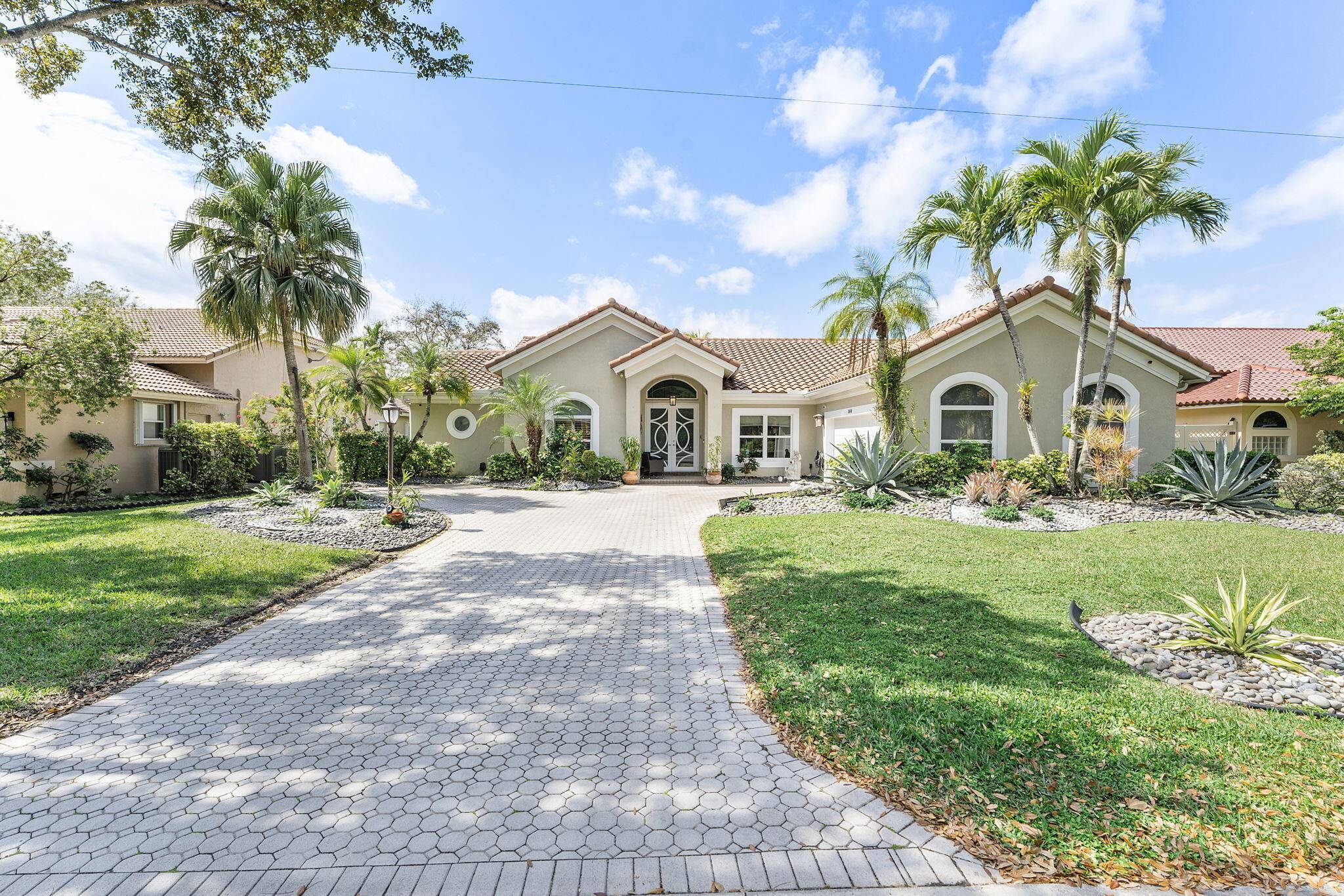 Welcome to this charming home in the heart of Coral Springs, Westview Village !