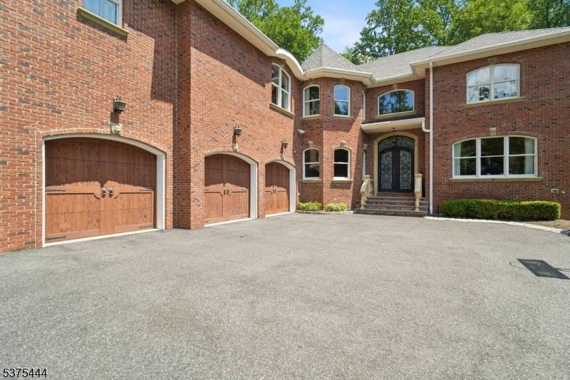 Exquisite Handcrafted Estate Nestled on a Private Cul de Sac Welcome to a masterpiece of timeless craftsmanship and modern luxury.