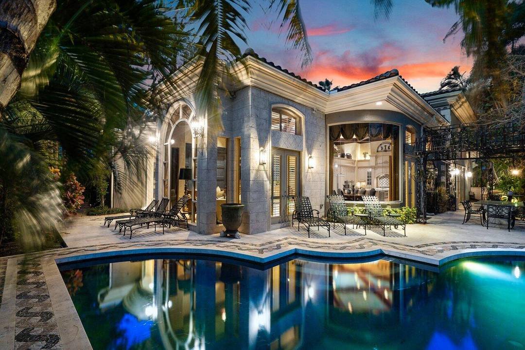 Welcome to 428 Addison Park Lane an exceptional one story estate nestled within the exclusive grounds of The Boca Raton.