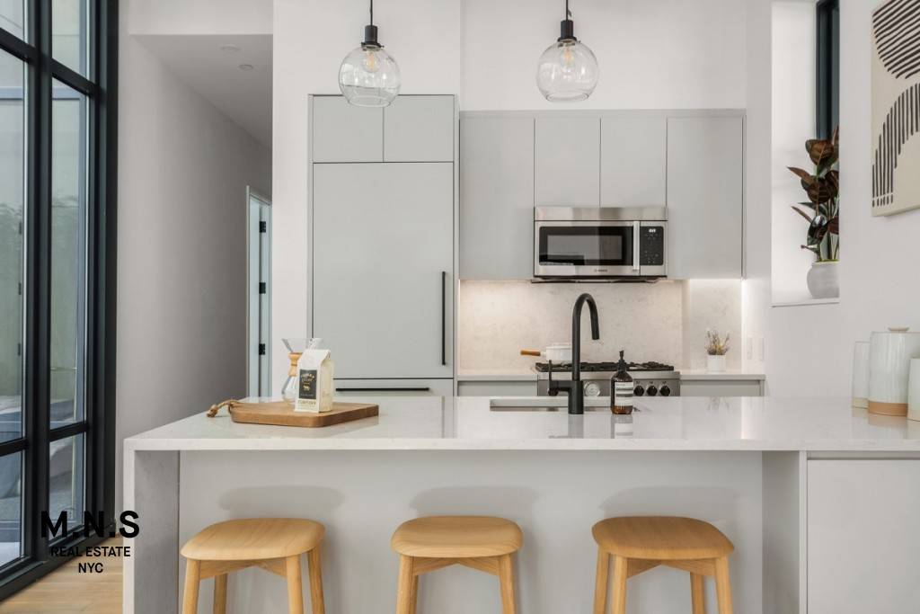 In the heart of residential Williamsburg sits a historic brick building on Metropolitan Avenue, a former 1943 umbrella factory still intact with its notable charm.