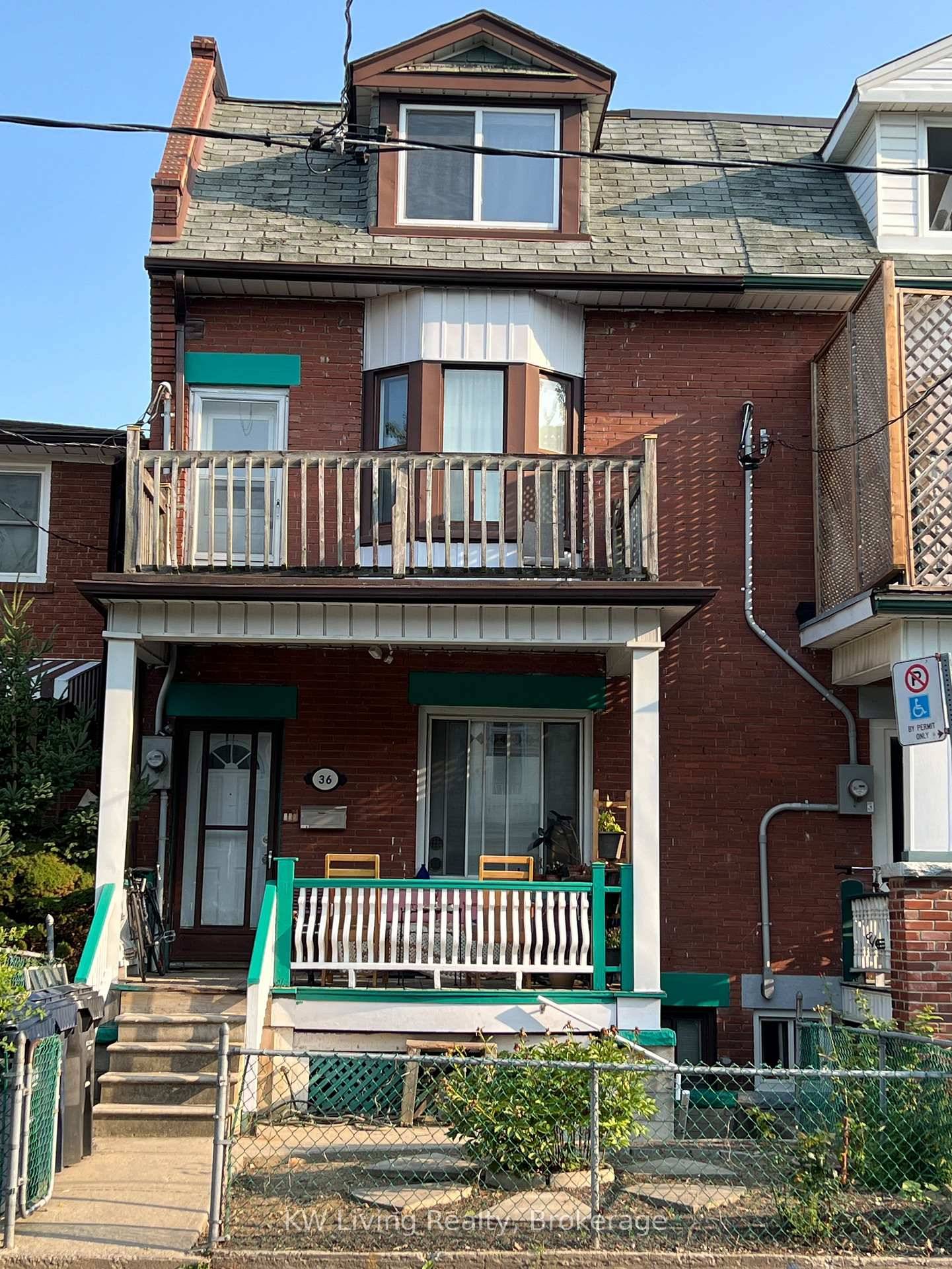 This charming 2 1 2 storey semi detached home offers generous living space with high ceilings, front and back separate entrances, natural light, and rear parking.