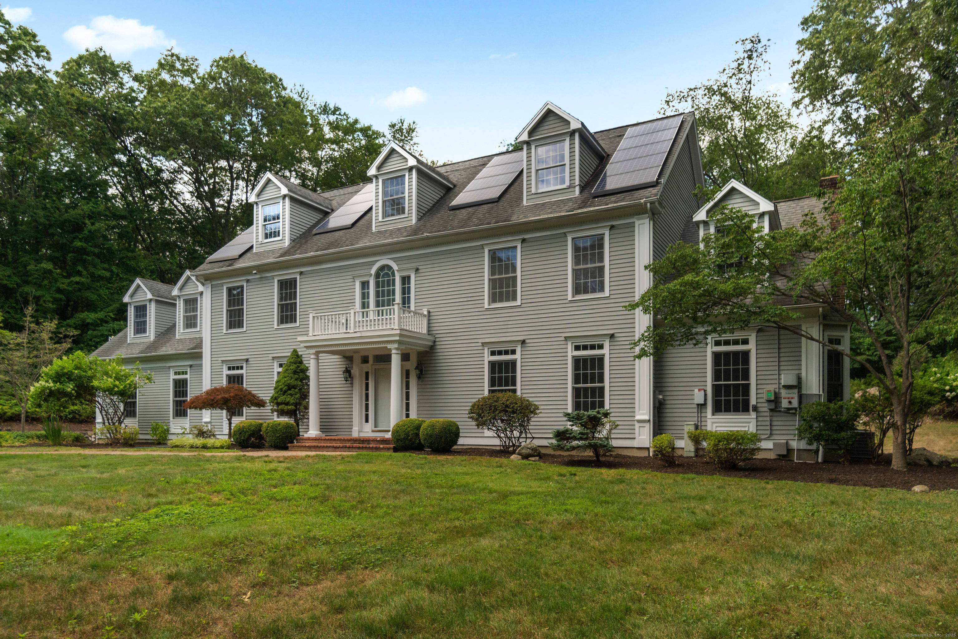 Nestled on a coveted cul de sac in Central Woodbridge, this gorgeous 5 bedroom Colonial is a rare gem offering privacy, space, and timeless craftsmanship.