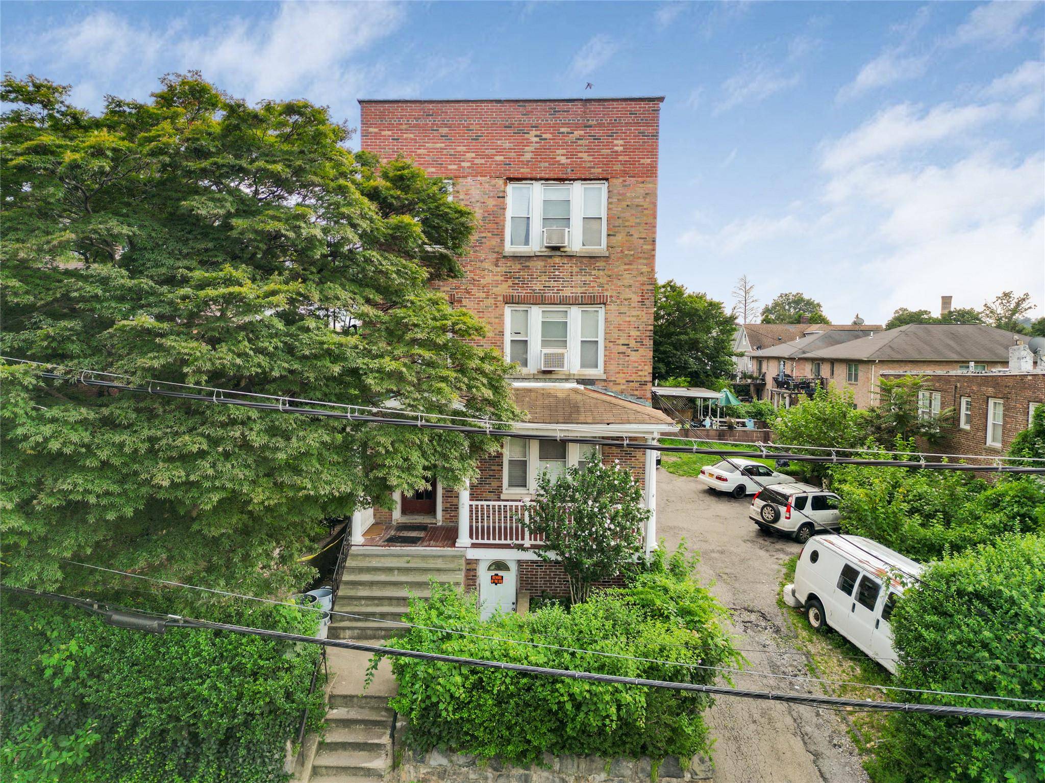 Welcome to 28 Palmer Road, Yonkers, a tremendous all Brick 6 Family Home nestled away in the Bryn Mawr vicinity of Yonkers.