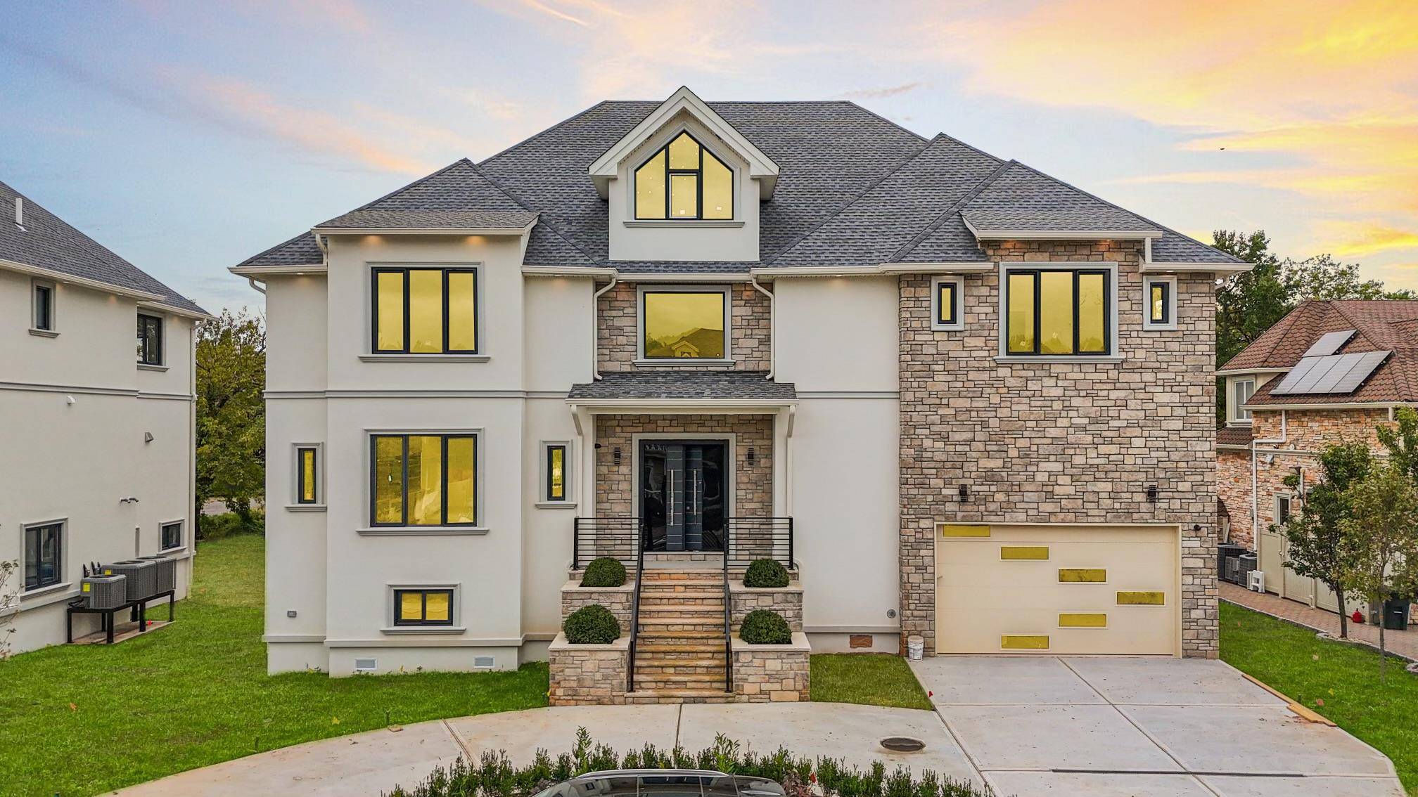 Stunning, Spacious, New Construction, Contemporary Waterfront Mansion in a Private Gated Community with Luxurious Custom Features and Breathtaking Views of Raritan Bay and Natures Beaty.