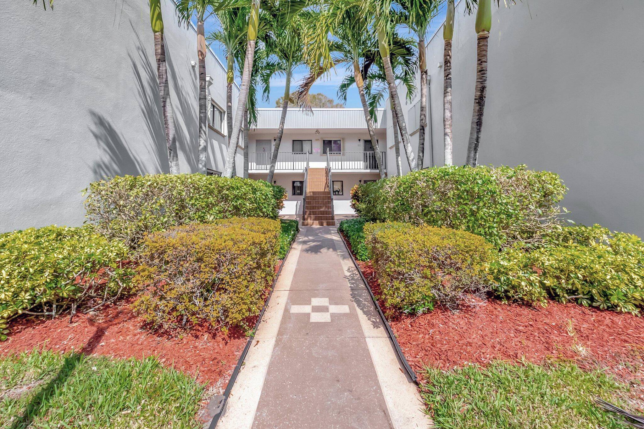Welcome to this beautifully remodeled two bedroom, two bath condo in the sought after gated community of Lakes of Delray.