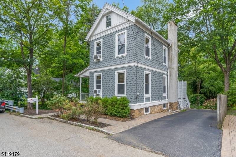 Stunning Victorian home nestled on a quiet, in town cul de sac, offering a rare blend of historic charm and modern convenience.