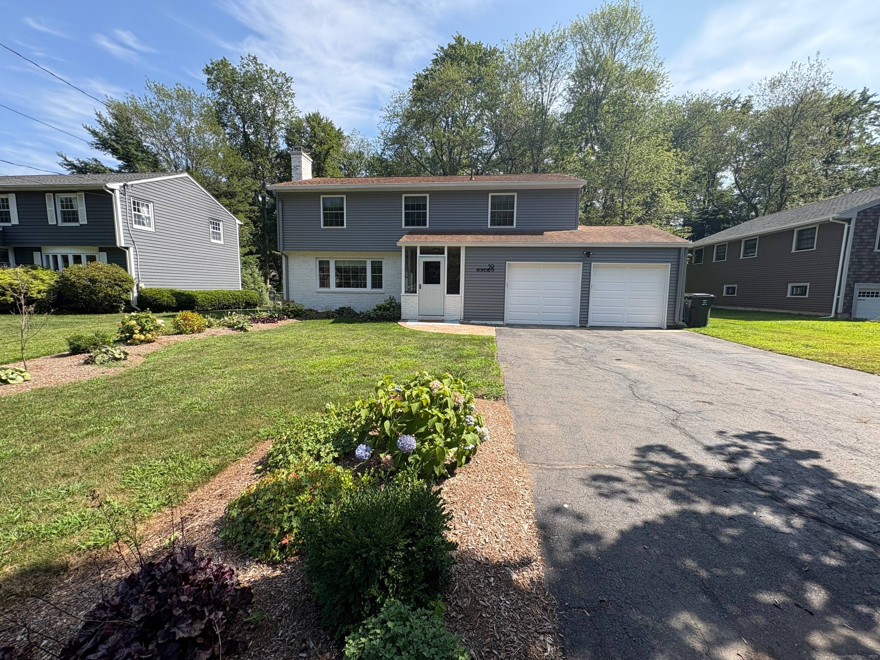 Welcome to 59 Richmond Lane a charming, move in ready single family home located in one of West Hartford's most sought after neighborhoods !