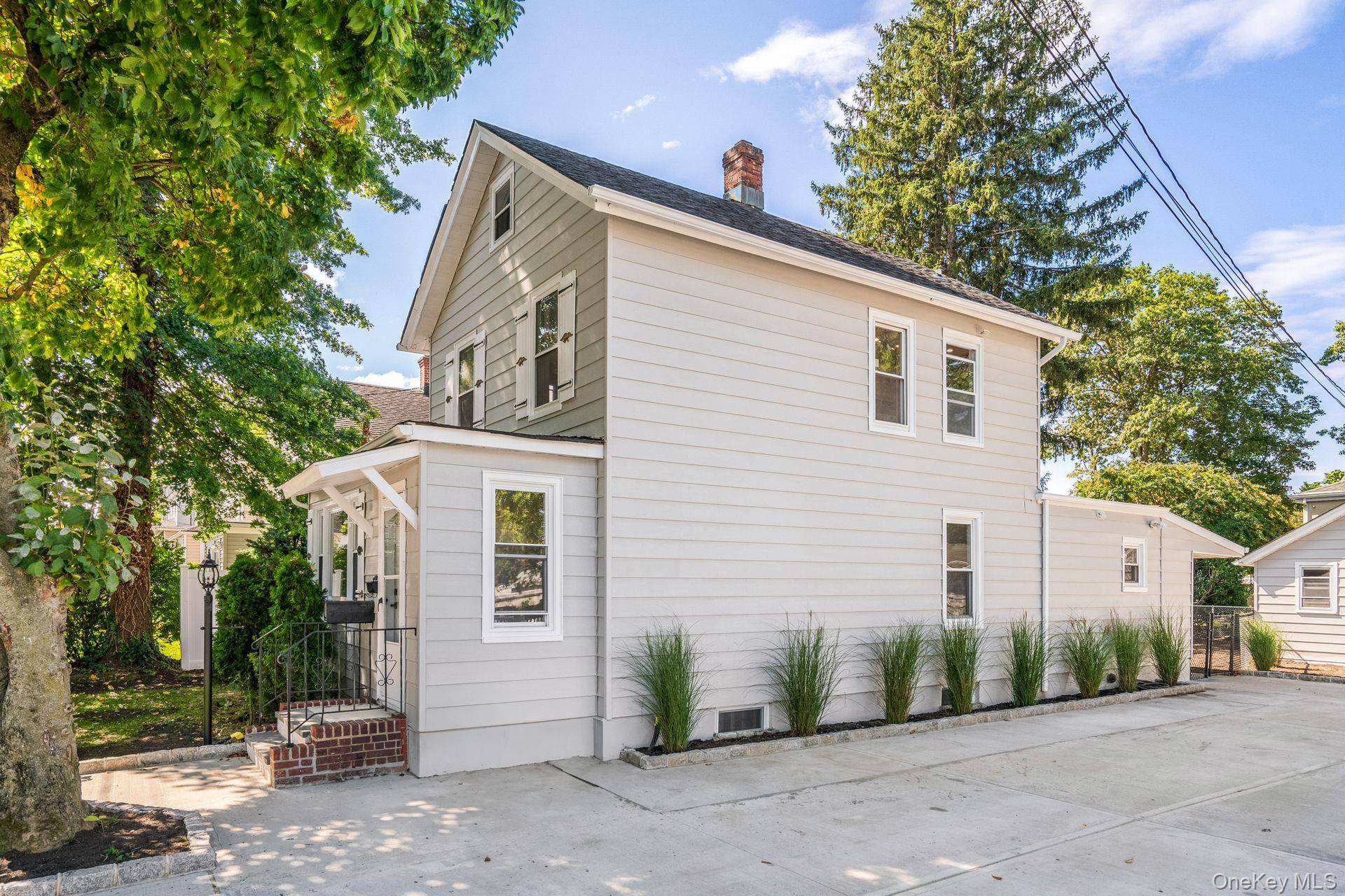 Colonial homes on a Spacious Property, All Newly Renovated 2024, Colonial home featuring living room with wood floors, dining room with wood floors, New Eat in kitchen, with all new ...