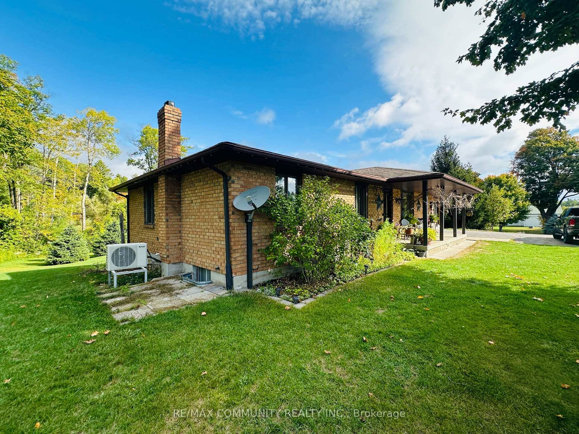Charming All Brick Bungalow with Walk Out Basement !