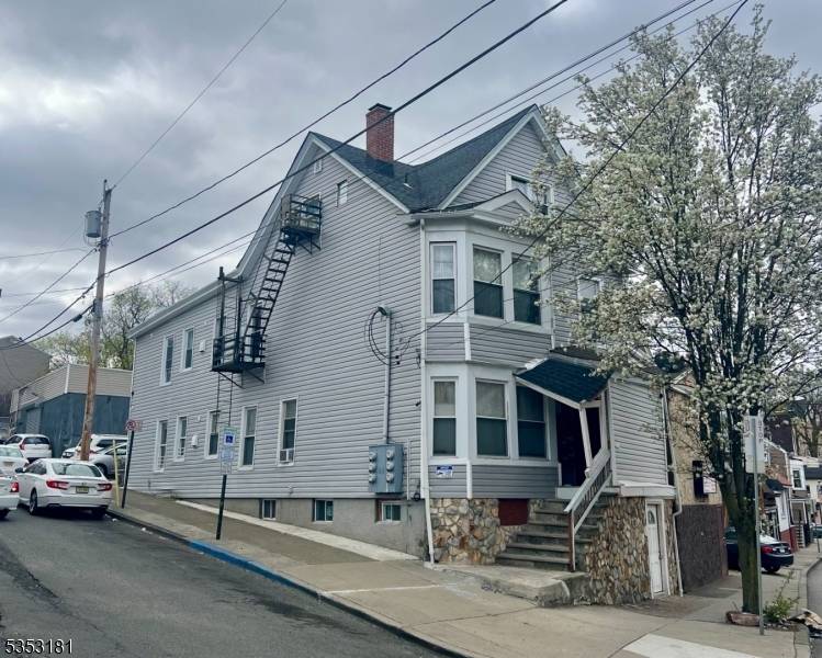 Six unit home for sale. First floor has a 1 bedroom unit and a 2 bedroom unit.