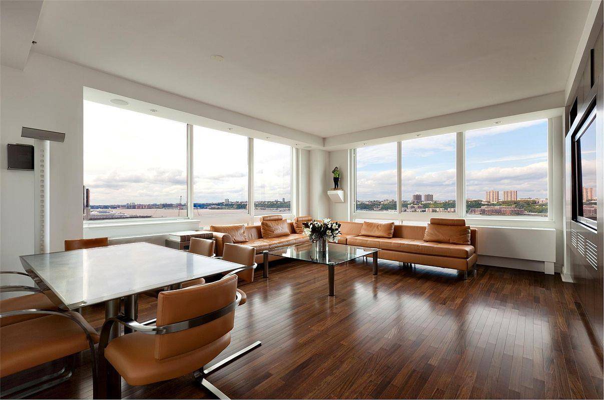 This magnificent apartment features floor to ceiling corner glass windows that offer breathtaking views of the Hudson River, along with stunning sunset and sky vistas.