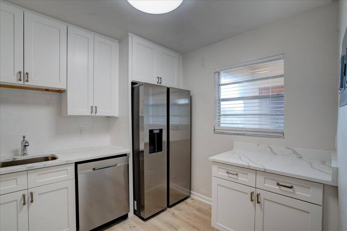 Experience tranquil living in this fully renovated 2 bedroom, 2 bathroom lake view condominium.
