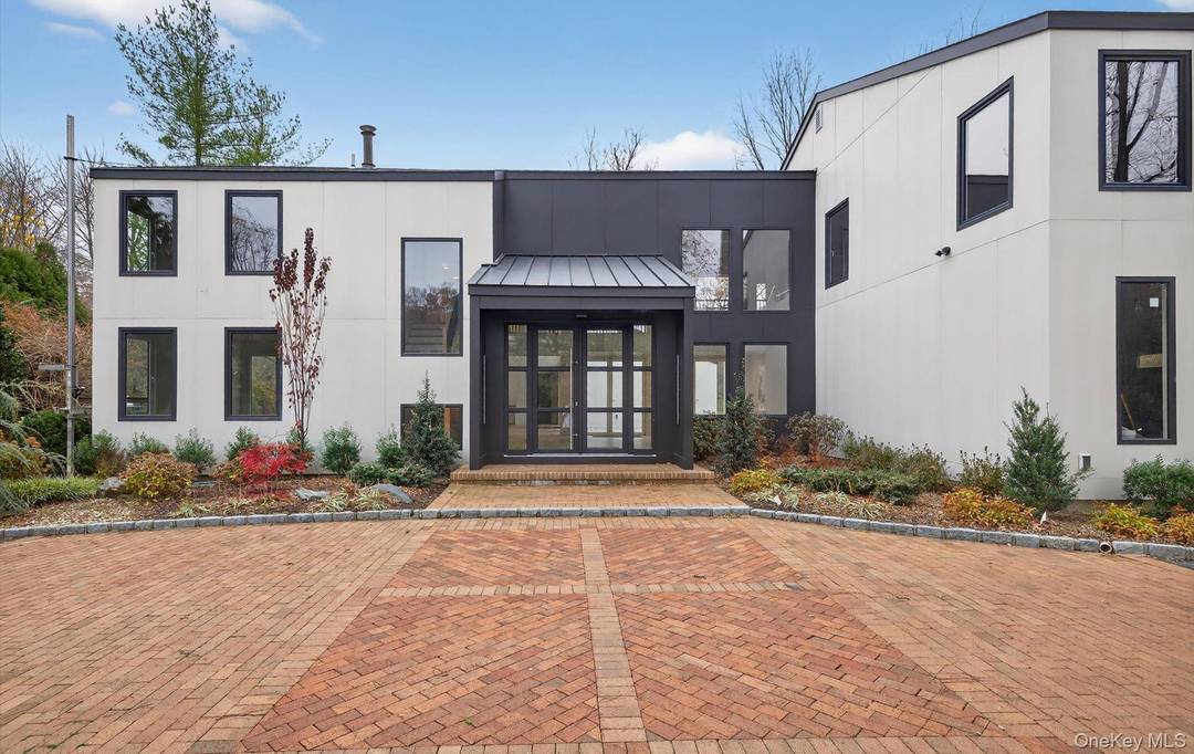 Elegant Contemporary Colonial Fully Renovated with Modern Flare.