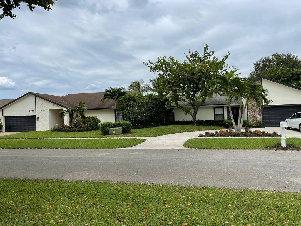 Beautiful vacation style fully furnished three bedroom home in the heart of Boca Raton.