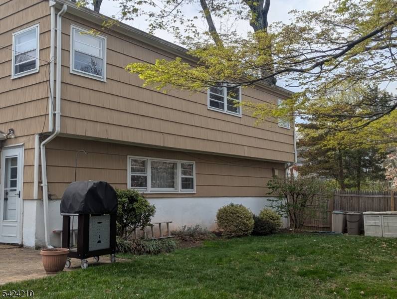 Welcome to this beautifully maintained split level home located in the highly desirable Netherwood Heights section of Plainfield.