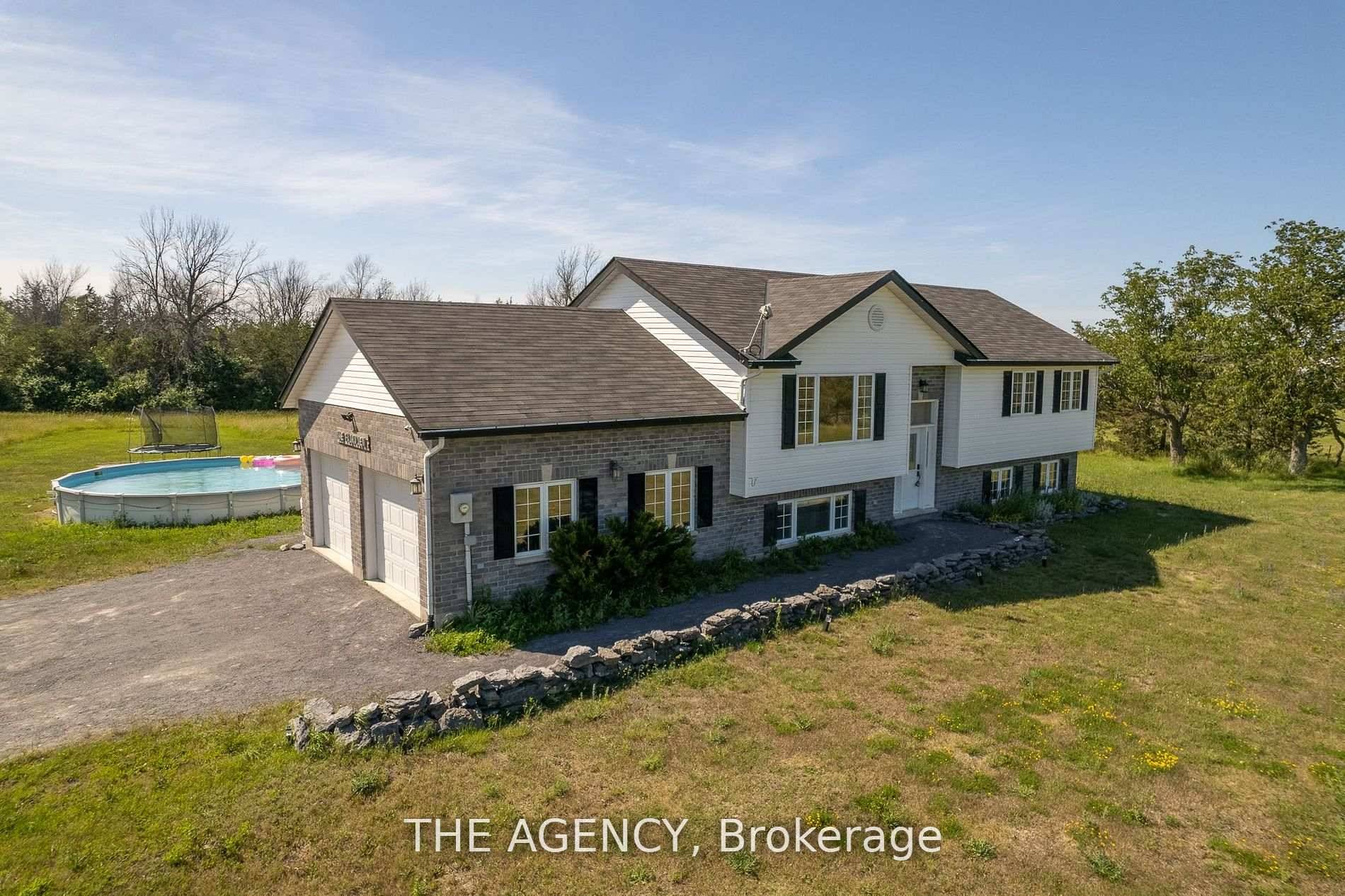 This fully furnished modern 4 bedroom home sits on 3.