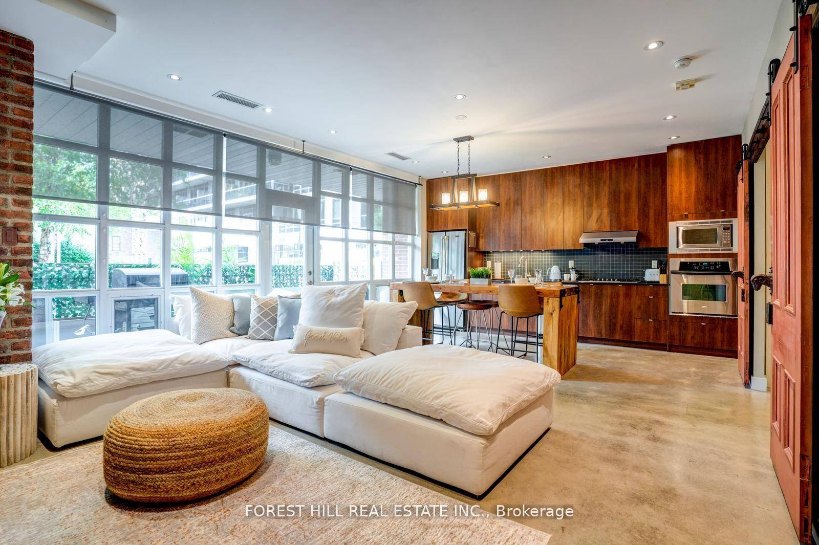 Live in the heart of king west village, Quad lofts, in this unique loft style condo.